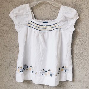 White ruffled blouse